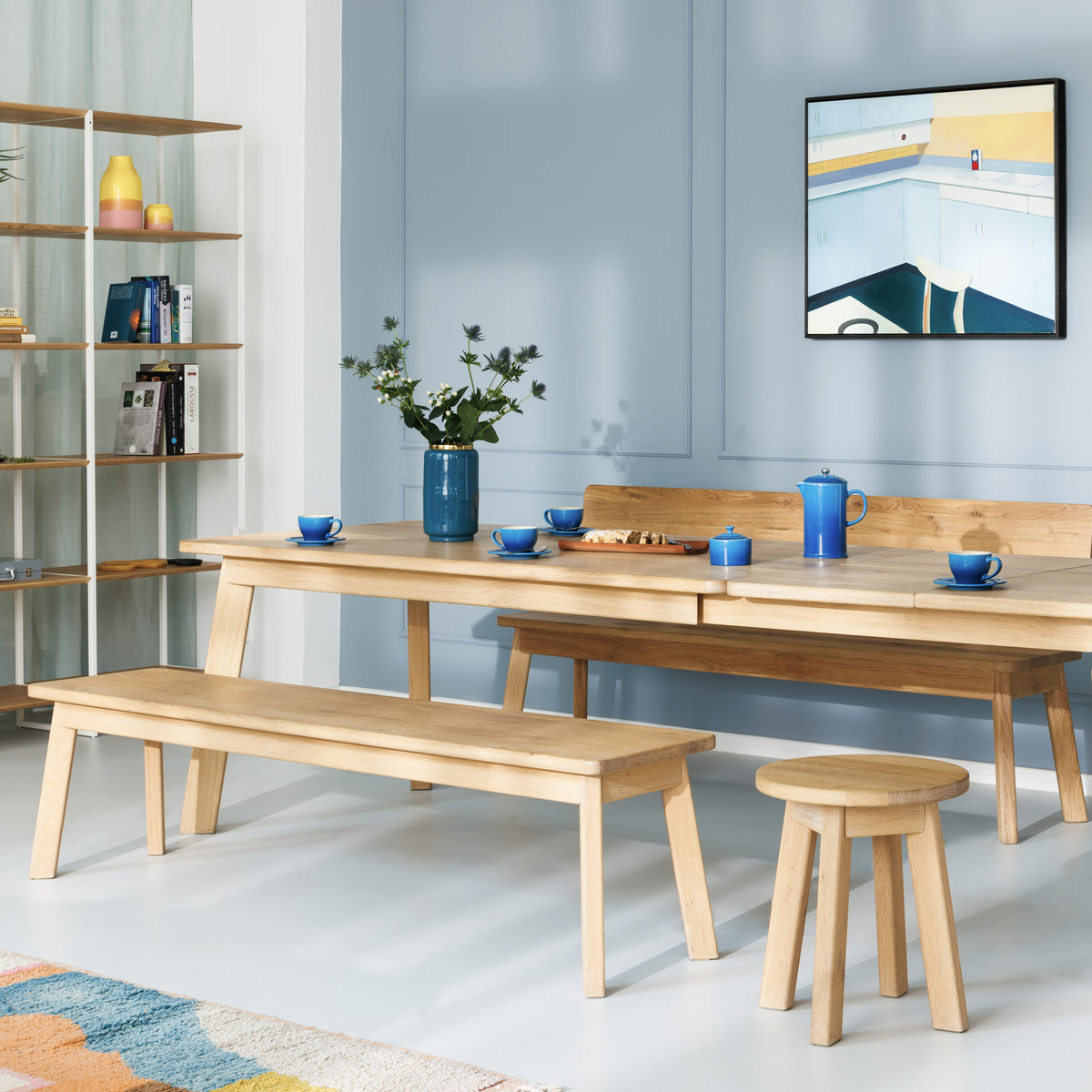 Versteckter Auszug bei Massivholztisch Form F auf Maß